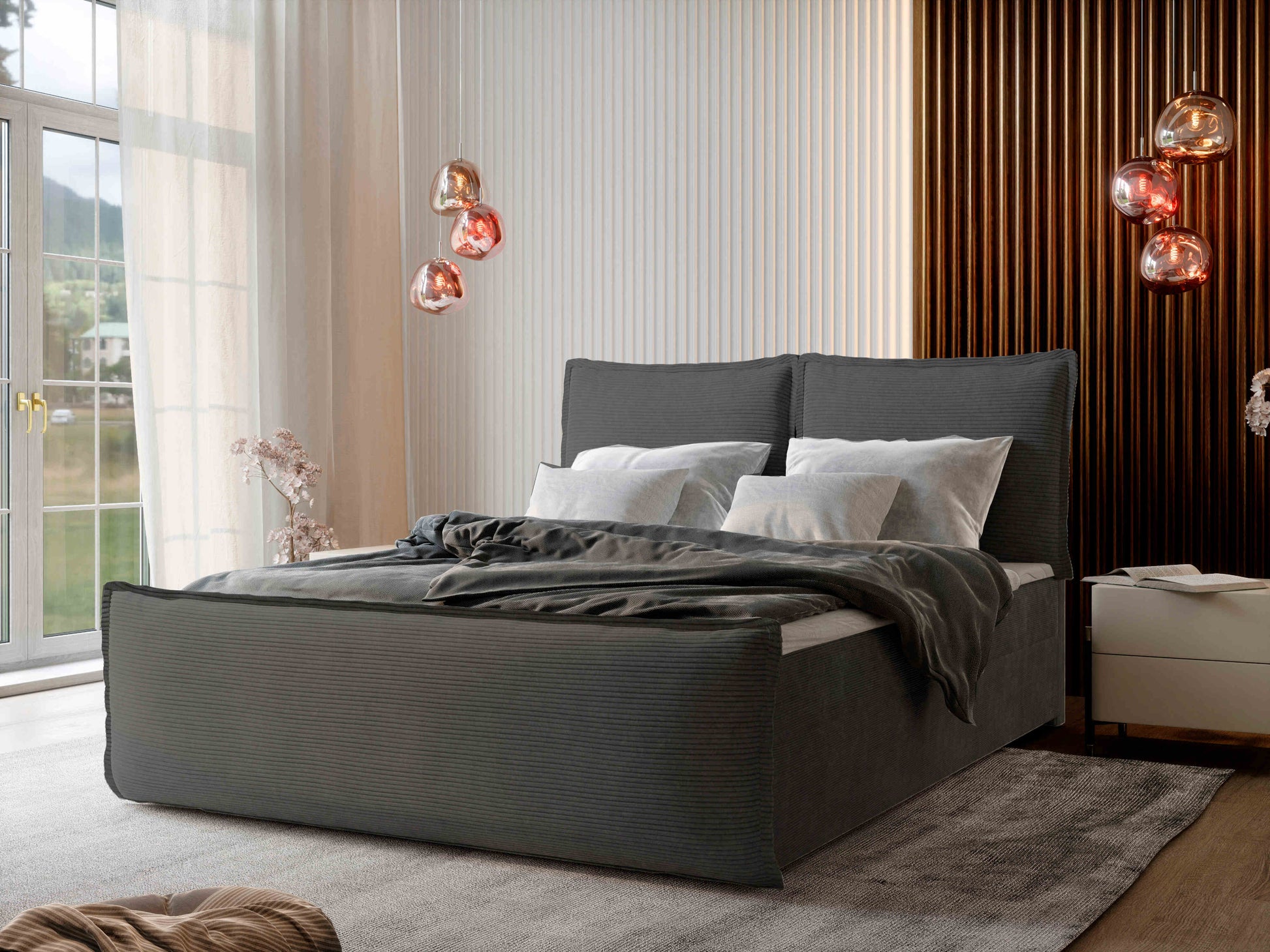 Schönes Schlafzimmer mit einem schönen Boxspringbett von Monta in der Farbe Dunkelgrau